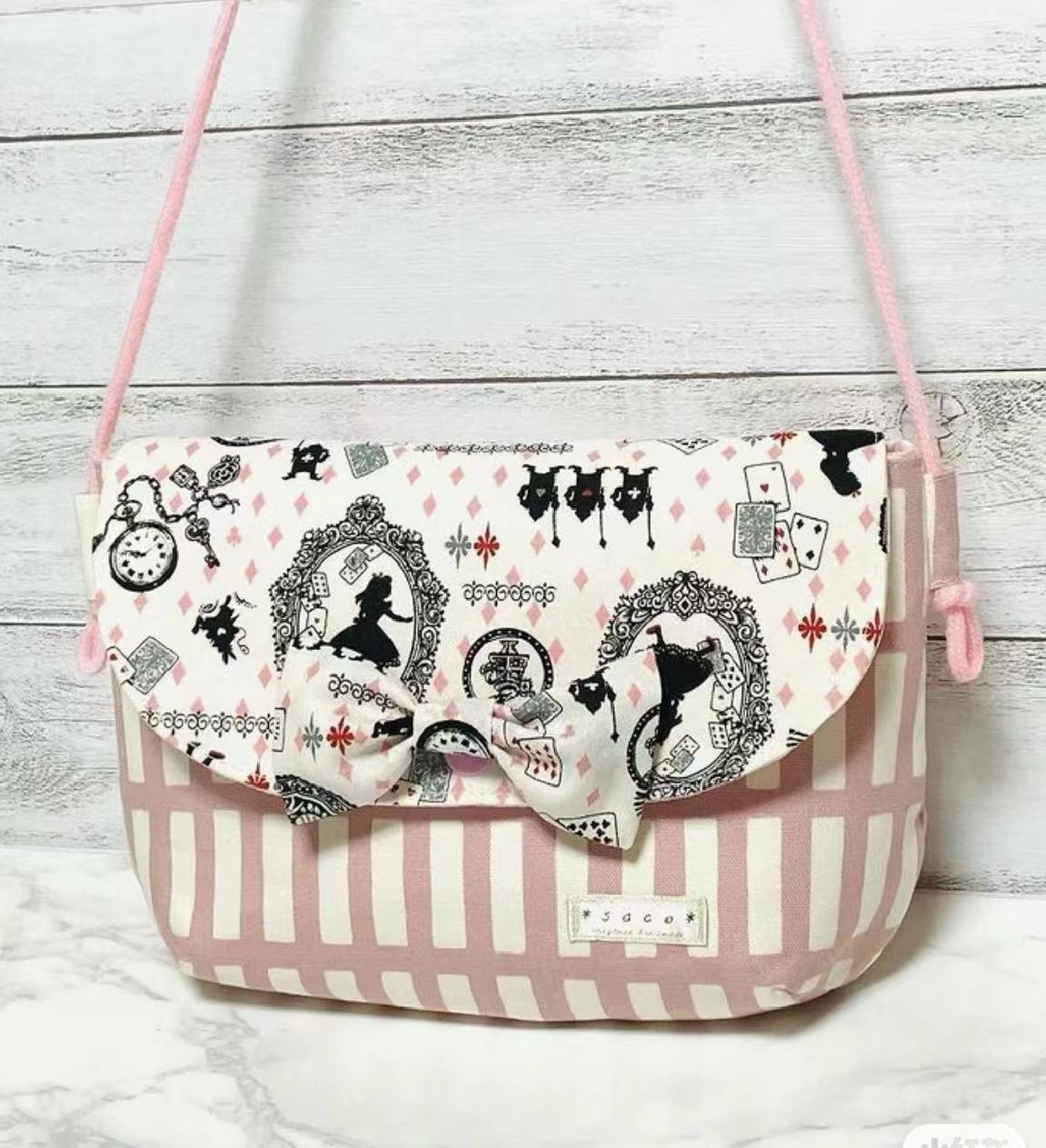 蝴蝶结翻盖小包