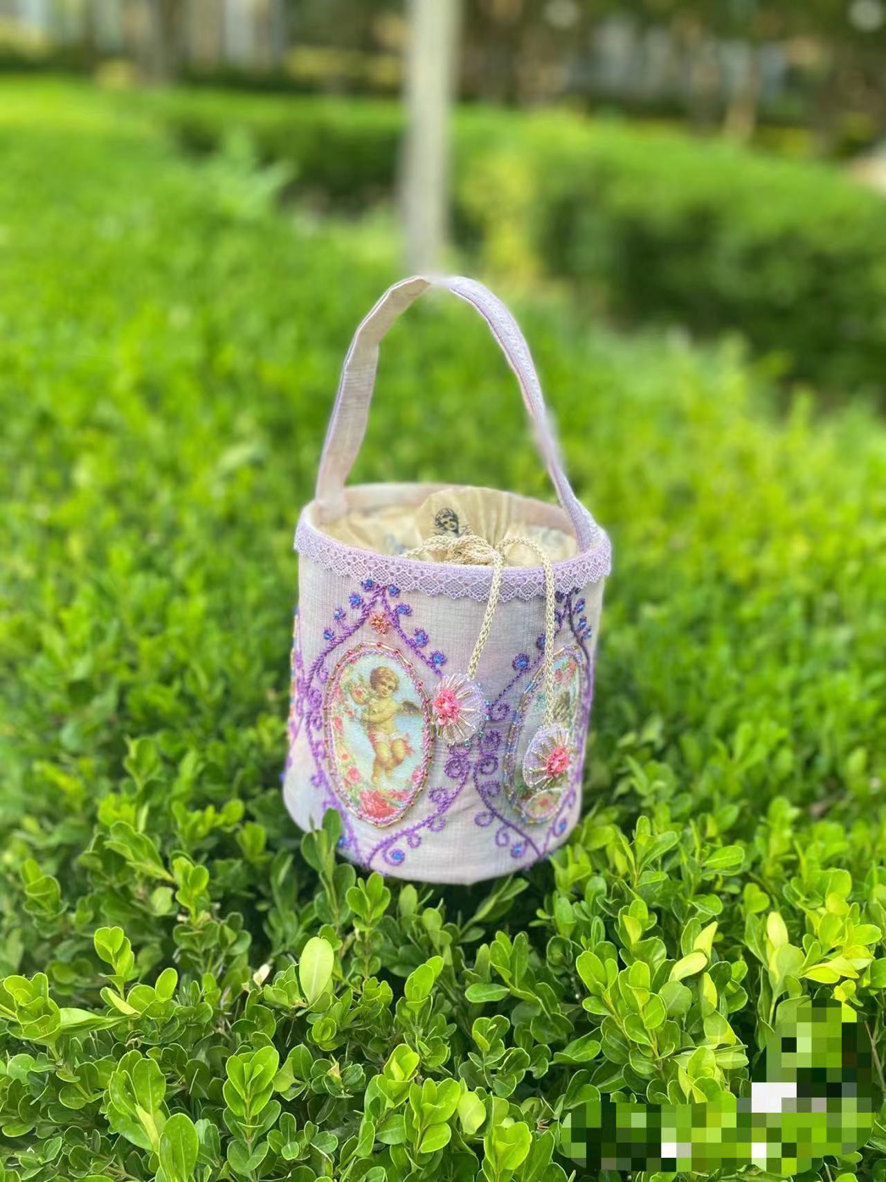 简约抽绳圆桶包